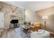 Cozy living room with unique decor, wood floors, and large windows for natural light at 804 Summer Dr, Highlands Ranch, CO 80126