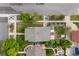 Aerial view of the property shows the deck, landscaping and the surrounding neighborhood at 2703 N Milwaukee St, Denver, CO 80205