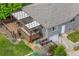 Aerial view showcases the spacious deck and the home's beautifully landscaped backyard at 2703 N Milwaukee St, Denver, CO 80205