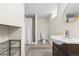 Well-lit bathroom boasts sleek vanity, step-in shower, and linen storage for a functional layout at 2703 N Milwaukee St, Denver, CO 80205