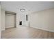 Bright bedroom features vinyl floor, closet and easy access to the bathroom with modern fixtures at 2703 N Milwaukee St, Denver, CO 80205
