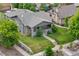 Exterior view of home with covered front porch and manicured front yard at 2703 N Milwaukee St, Denver, CO 80205