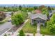 Charming home with mature trees and a well-maintained lawn at 2703 N Milwaukee St, Denver, CO 80205