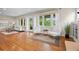 Bright and airy living room with hardwood floors, comfortable seating, and views of the yard at 2703 N Milwaukee St, Denver, CO 80205