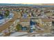 House and surrounding neighborhood, mountain view in the distance at 16686 Rinker Way, Broomfield, CO 80023