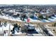 Aerial view of house and neighborhood in winter at 16686 Rinker Way, Broomfield, CO 80023