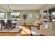 Dining room with hardwood floors and access to a sitting area at 16686 Rinker Way, Broomfield, CO 80023