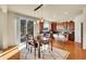 Spacious dining area near the kitchen, featuring hardwood floors and lots of natural light at 16686 Rinker Way, Broomfield, CO 80023