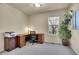 Bright home office features built-in desk and ample natural light at 16686 Rinker Way, Broomfield, CO 80023