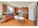 Modern kitchen with granite countertops and stainless steel appliances at 16686 Rinker Way, Broomfield, CO 80023