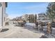 Large patio with dining, bar and fire pit at 16686 Rinker Way, Broomfield, CO 80023