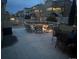 Outdoor patio with seating area and fire pit, perfect for entertaining guests at 16686 Rinker Way, Broomfield, CO 80023