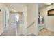 Upstairs hall with laundry and additional storage at 16686 Rinker Way, Broomfield, CO 80023