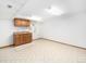 Finished basement with kitchenette and ample space at 245 Cedar St, Hudson, CO 80642