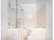 Walk-in shower with grab bars and accessible bathtub at 245 Cedar St, Hudson, CO 80642