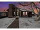 Charming ranch home with wood siding and snow-covered yard at 245 Cedar St, Hudson, CO 80642