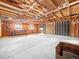 Unfinished garage with high ceilings and open space at 245 Cedar St, Hudson, CO 80642