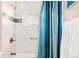 Modern bathroom showcasing a tiled shower with mosaic details and updated fixtures at 200 The Lane Rd, Golden, CO 80403