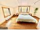 Spacious bedroom featuring three windows letting in ample natural light at 200 The Lane Rd, Golden, CO 80403