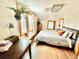 Bedroom featuring natural light, wood floors, and comfortable furnishings at 200 The Lane Rd, Golden, CO 80403