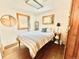 Bright bedroom with hardwood floors, two windows, and simple decor create a cozy retreat at 200 The Lane Rd, Golden, CO 80403