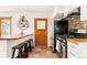 Eat in kitchen with butcher block countertop and stainless steel appliances at 200 The Lane Rd, Golden, CO 80403