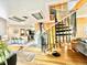 Open-concept living area featuring a spiral staircase, wood accents, and a view into the kitchen at 200 The Lane Rd, Golden, CO 80403