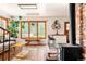 Cozy living room featuring a wood burning stove and picture window showcasing the outdoors at 200 The Lane Rd, Golden, CO 80403