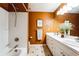 Bathroom features a tub, shower, and double vanity with ample counter space at 15407 E Crestline Pl, Centennial, CO 80015