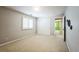 Neutral bedroom offers a window with shutters and a double closet at 15407 E Crestline Pl, Centennial, CO 80015