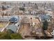 An aerial view of a neighborhood with mixed housing styles and mature trees at 1117 Lincoln Ave, Louisville, CO 80027