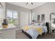 Cozy bedroom with large windows, creating a bright and airy space for relaxation at 17358 W 95Th Ave, Arvada, CO 80007