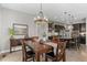 Elegant dining area connected to a modern kitchen, perfect for Gathering meals and gatherings at 17358 W 95Th Ave, Arvada, CO 80007
