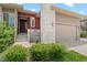 Inviting front entrance with a well-manicured lawn, stylish facade, and a cozy porch area at 17358 W 95Th Ave, Arvada, CO 80007