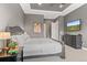 Comfortable main bedroom features a trey ceiling, and neutral colors offering a calming retreat at 17358 W 95Th Ave, Arvada, CO 80007