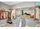 Walk-in closet featuring built-in shelving and ample storage space at 11950 Mosey Ct, Parker, CO 80138