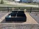Elevated garden beds offer an inviting space for growing flowers and vegetables in the backyard at 11950 Mosey Ct, Parker, CO 80138
