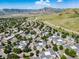 Residential aerial view showcasing landscaping, streets, and mountain views at 1697 S Cole St # B5, Lakewood, CO 80228