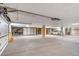 Open-concept parking and storage basement featuring painted walls and a bright ceiling at 1697 S Cole St # B5, Lakewood, CO 80228