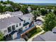 Exterior view featuring private balconies, manicured lawn, and parking at 1697 S Cole St # B5, Lakewood, CO 80228