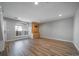 Bright living room with wood floors, built-in shelving, and lots of natural light at 1697 S Cole St # B5, Lakewood, CO 80228