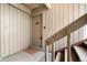 Front door with welcome mat of unit 103, with the stairs to the upper level on the right side at 4068 S Atchison Way # 103, Aurora, CO 80014
