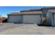 Attached garages offer convenience and ample parking space for residents of this multi-unit property at 15690 E Mexico Ave, Aurora, CO 80017