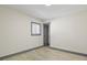 Bright bedroom features neutral walls and trim plus wood-look floors at 104 Stuart St, Denver, CO 80219