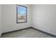 Cozy bedroom with neutral paint, hardwood floors and lots of sunlight at 104 Stuart St, Denver, CO 80219