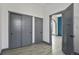 Hallway featuring grey shaker doors and trim at 104 Stuart St, Denver, CO 80219