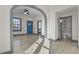 Bright open-concept area leading to the bathroom and kitchen at 104 Stuart St, Denver, CO 80219