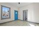 Bright living room with a large window and new floors at 104 Stuart St, Denver, CO 80219