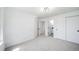 Clean, bright bedroom with plush carpet, neutral paint, and closet, offering a peaceful space at 1673 S Fulton St, Aurora, CO 80247