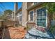 Inviting front entrance with stylish brickwork, updated fixtures, and a well-maintained small patio at 1673 S Fulton St, Aurora, CO 80247